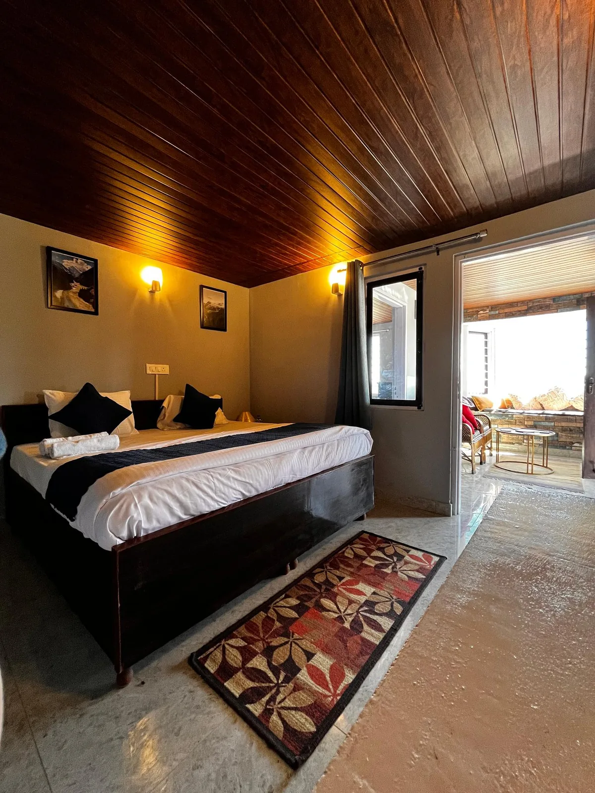 Workspace at Ecoescape Mukteshwar — desk facing the Himalayan ridge